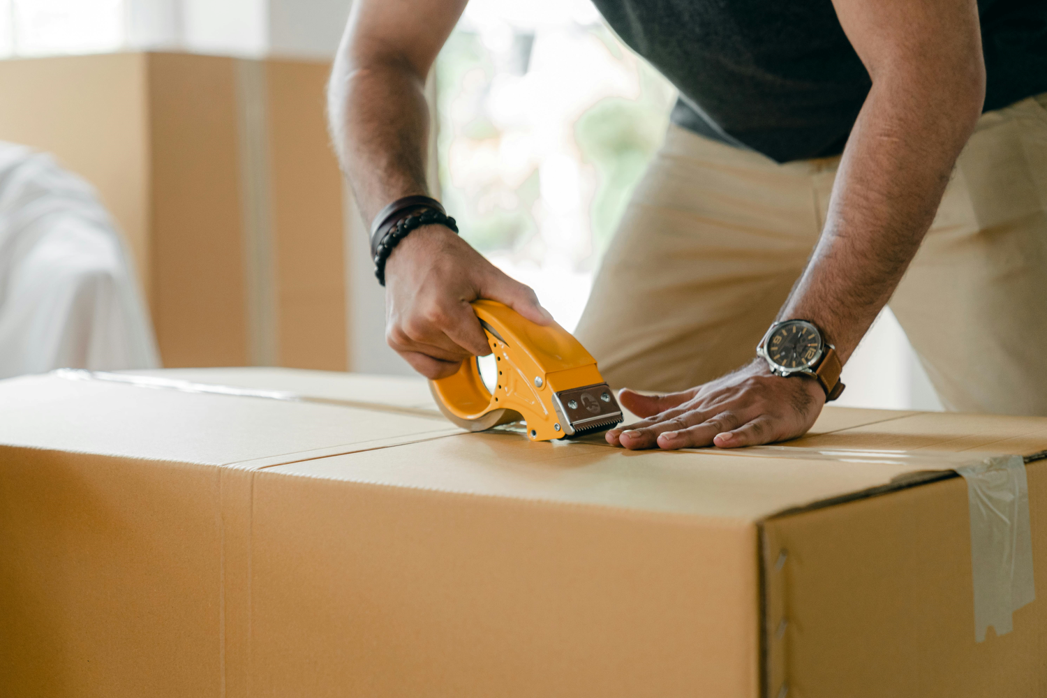 packing a box with moving services in Westchester